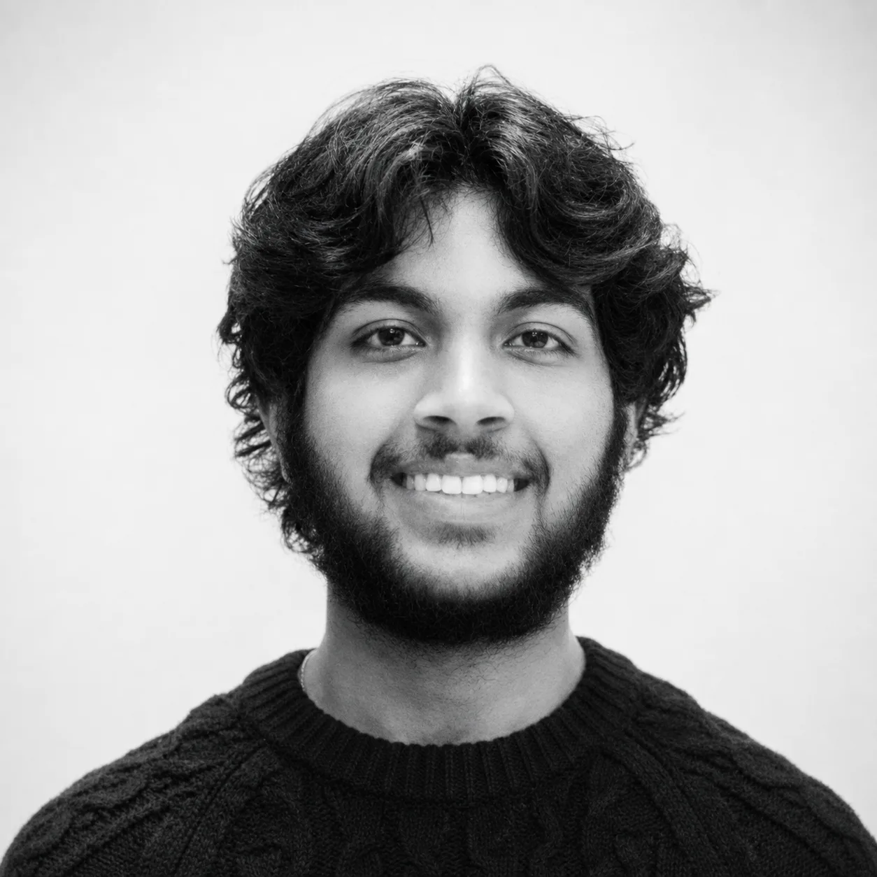 Manraj Mondair smiling at the camera